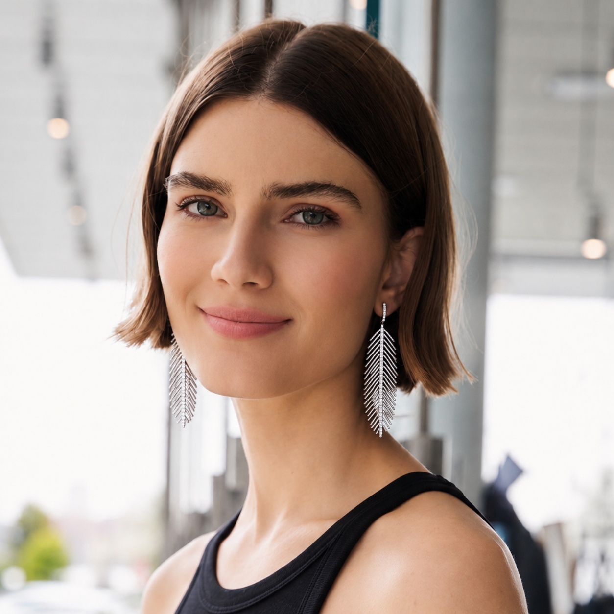 Feathers That Move Earrings with Diamond Spine