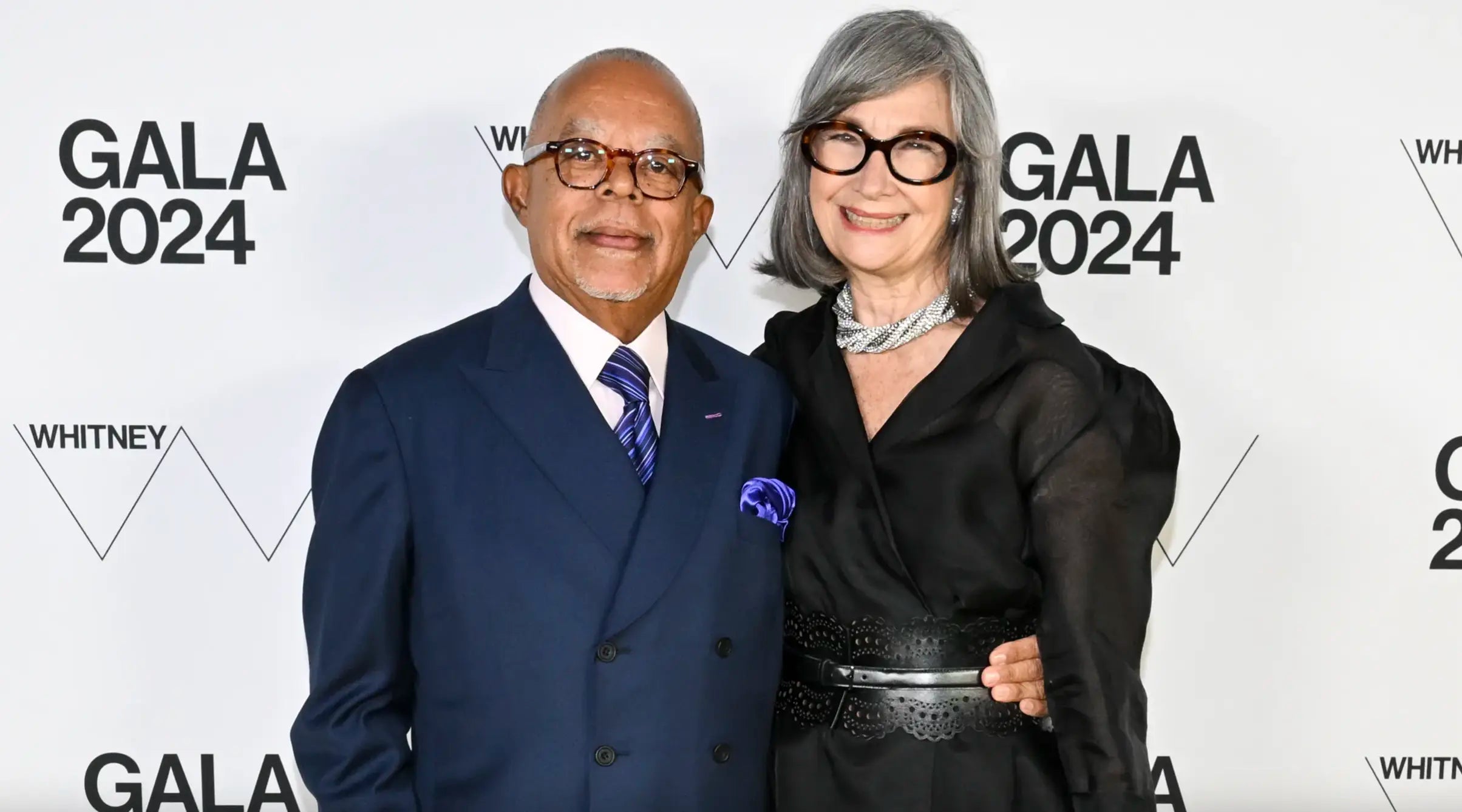 A photo of Brooke Garber Neidich a the 2024 Whitney Gala. Brooke is wearing intertwined diamond rope necklaces and a diamond lunetta necklace on her neck.